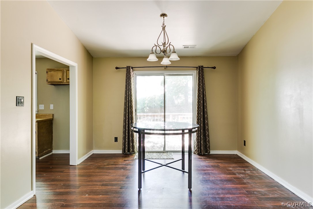 6430 Jessup Road Chesterfield, VA 23832 - Photo 7 of 26 wooden floor in an empty room with a window