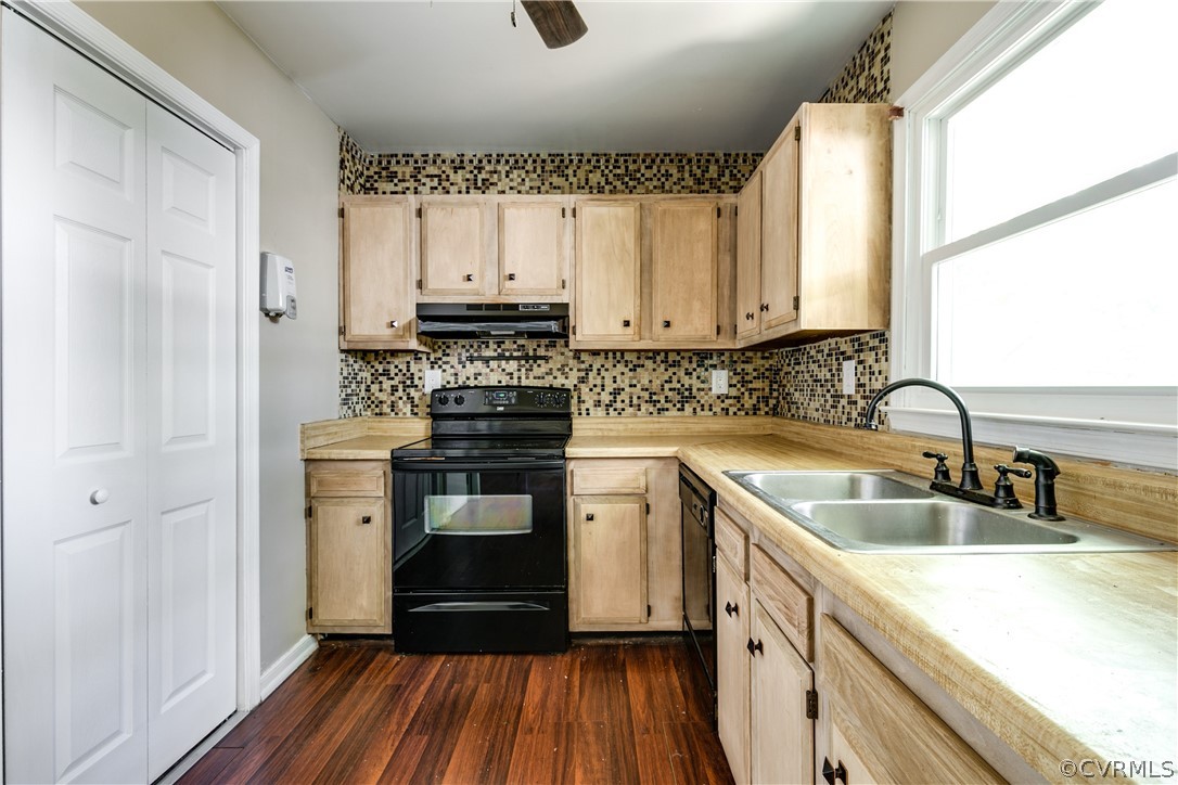 6430 Jessup Road Chesterfield, VA 23832 - Photo 10 of 26 a kitchen with a sink stove and cabinets