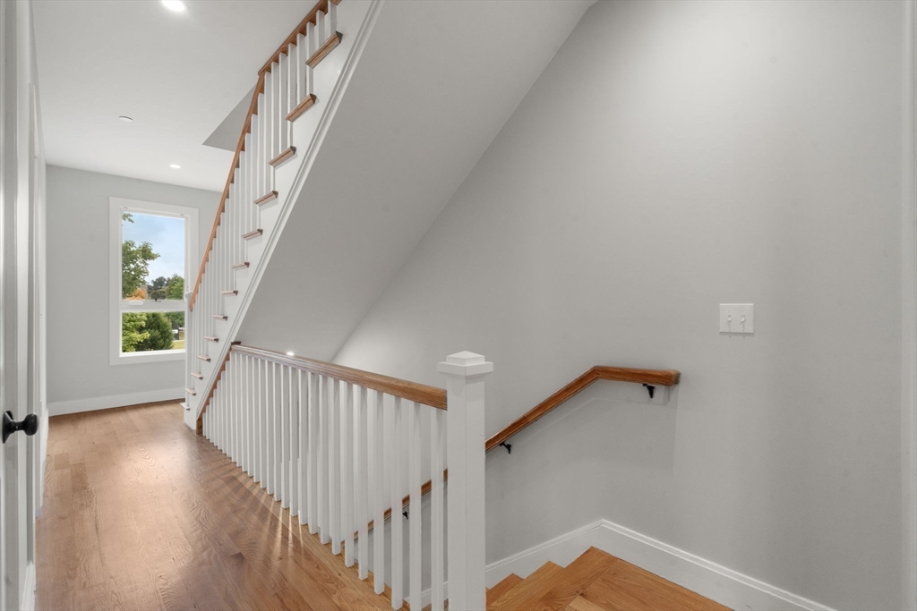 123-125 Centre Street, Unit TH7 Boston, MA 02124 - Photo 24 of 37 a view of a hallway view with staircase