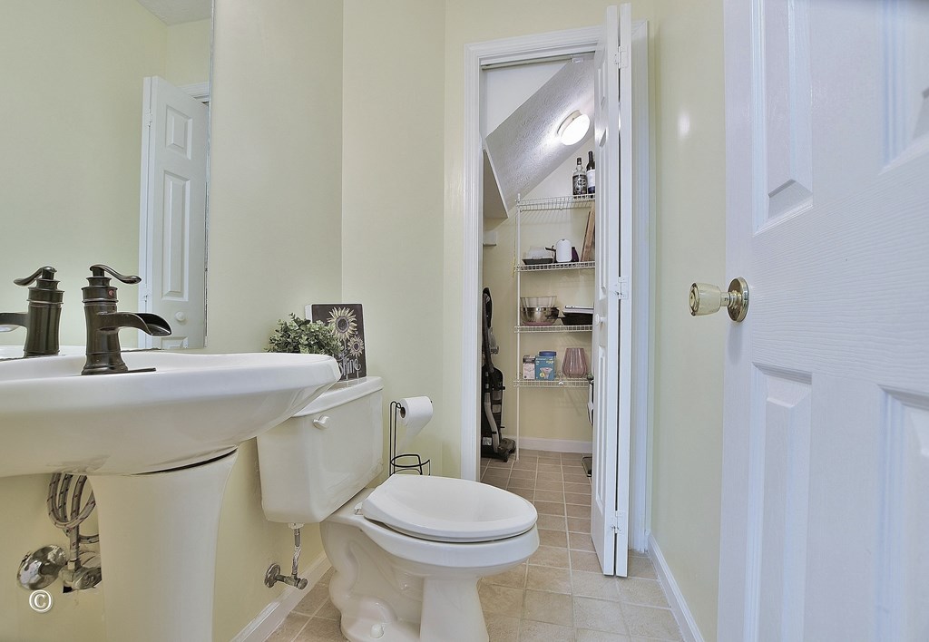 4968 Daybreak Lane Columbus, GA 31909 - Photo 11 of 24 a bathroom with a sink toilet and shower