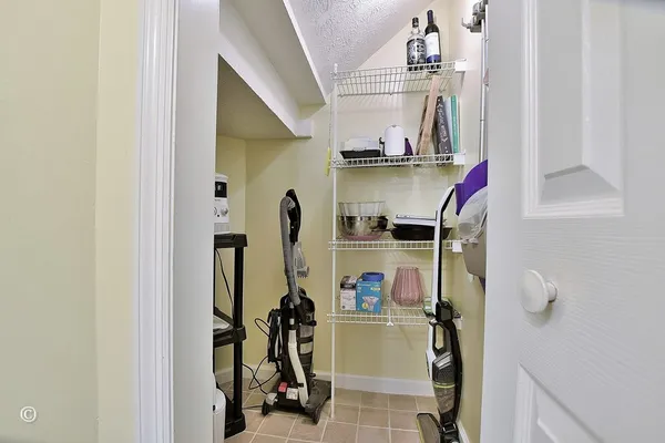 a view of storage and utility room