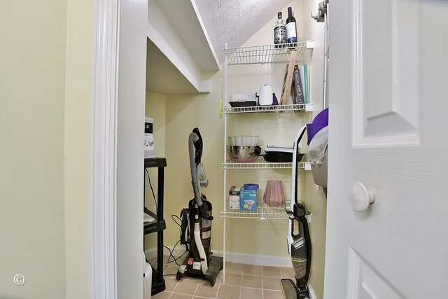 a view of storage and utility room