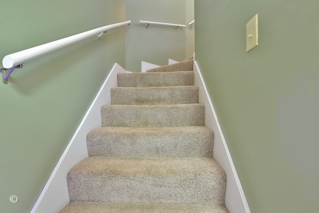 4968 Daybreak Lane Columbus, GA 31909 - Photo 13 of 24 a view of staircase with white walls
