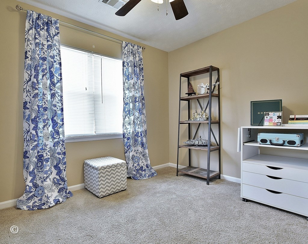 4968 Daybreak Lane Columbus, GA 31909 - Photo 14 of 24 a living room with furniture and a window
