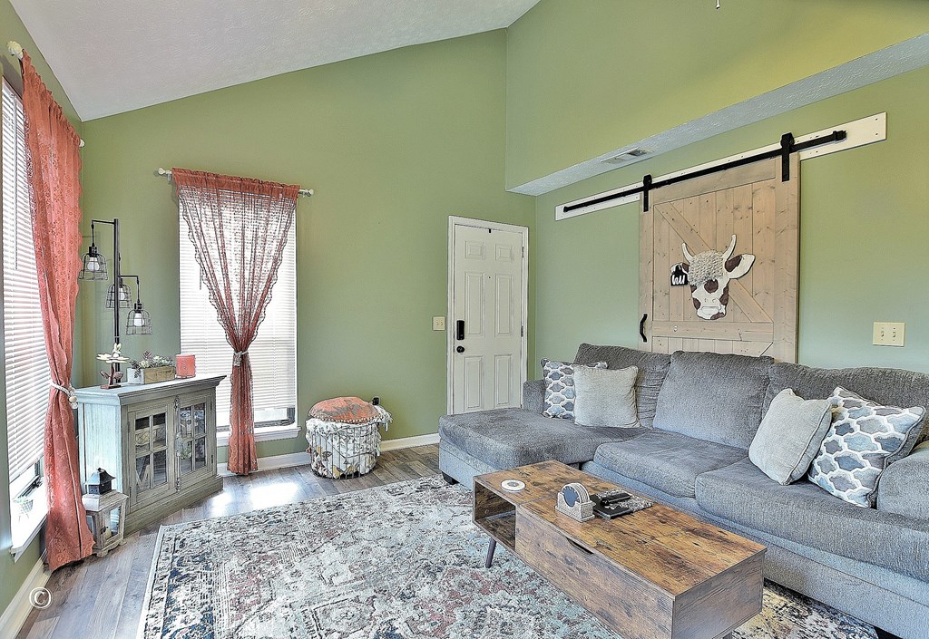 4968 Daybreak Lane Columbus, GA 31909 - Photo 4 of 24 a living room with furniture and a rug