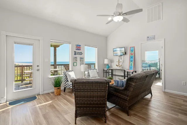 a living room with furniture and a window