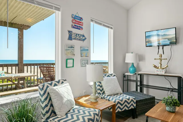 a living room with furniture and a window