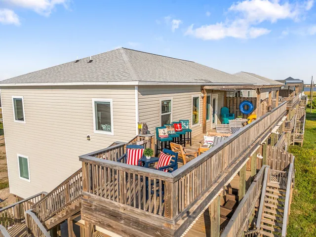 a view of a balcony with furniture