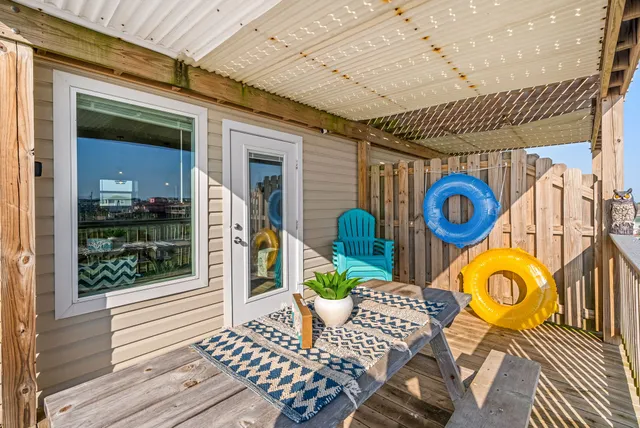 a view of a dinning tables and chairs in patio