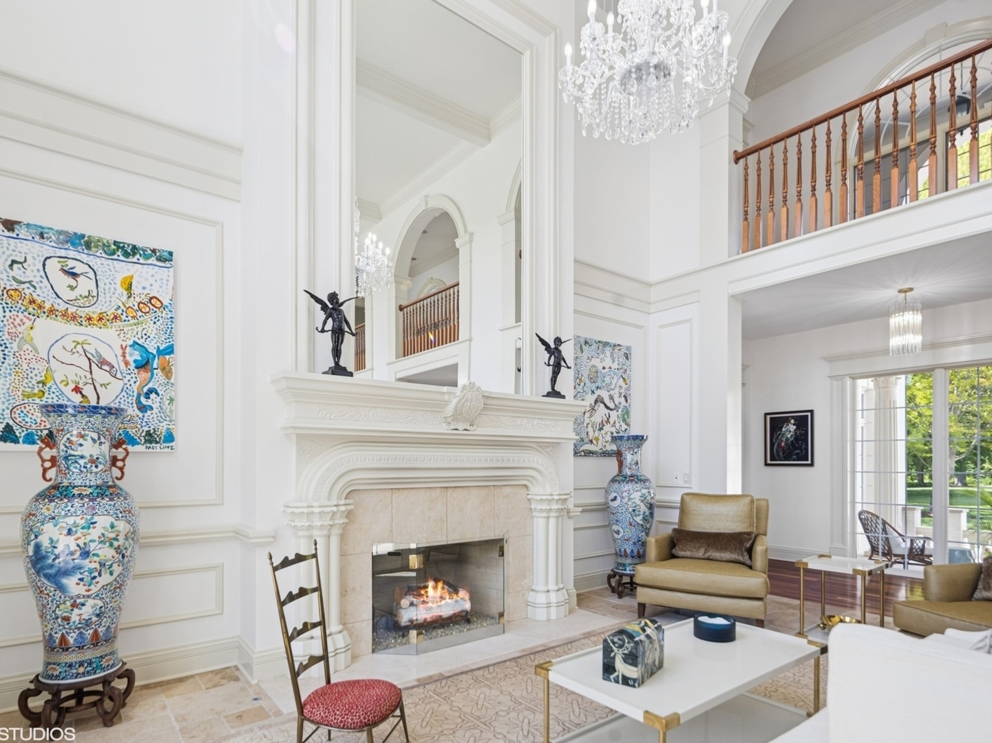 5-n113 Burr Road St. Charles, IL 60175 - Photo 14 of 130 a living room with furniture a fireplace and a chandelier