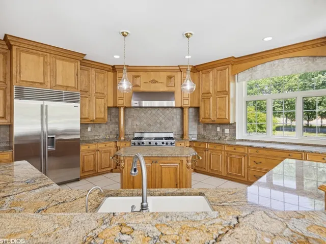 a view of a livingroom with furniture window and wooden floor