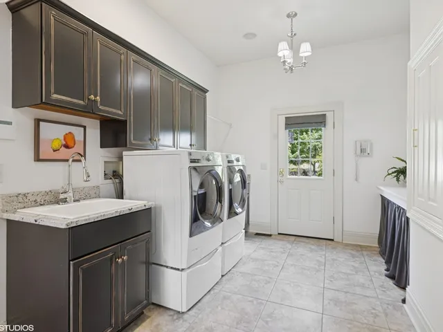 a view of entry way with wooden floor and a living room