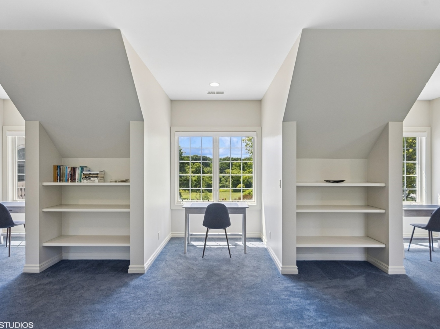 5-n113 Burr Road St. Charles, IL 60175 - Photo 37 of 130 a living room with furniture and a bed