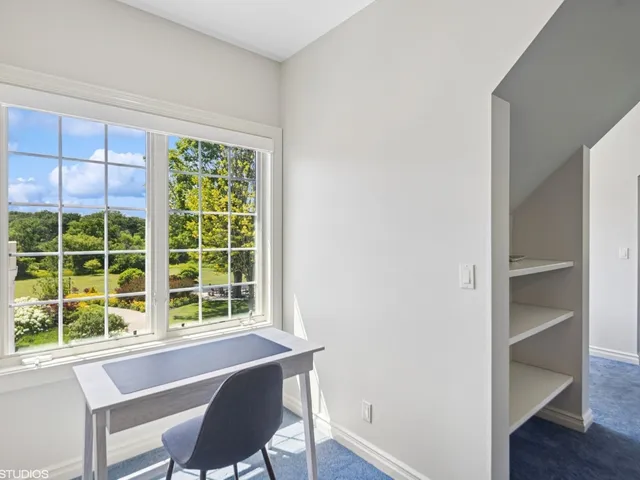 a room with furniture and a chandelier