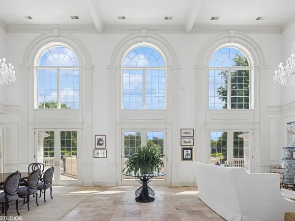 a kitchen with stainless steel appliances granite countertop a stove a refrigerator and a sink