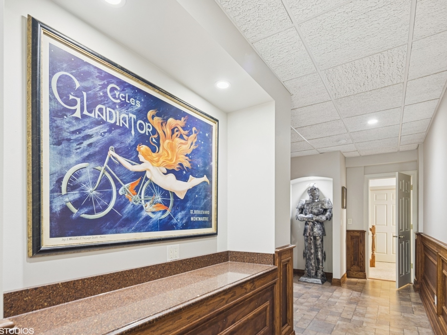 5-n113 Burr Road St. Charles, IL 60175 - Photo 87 of 130 a view of a hallway with paintings on the wall