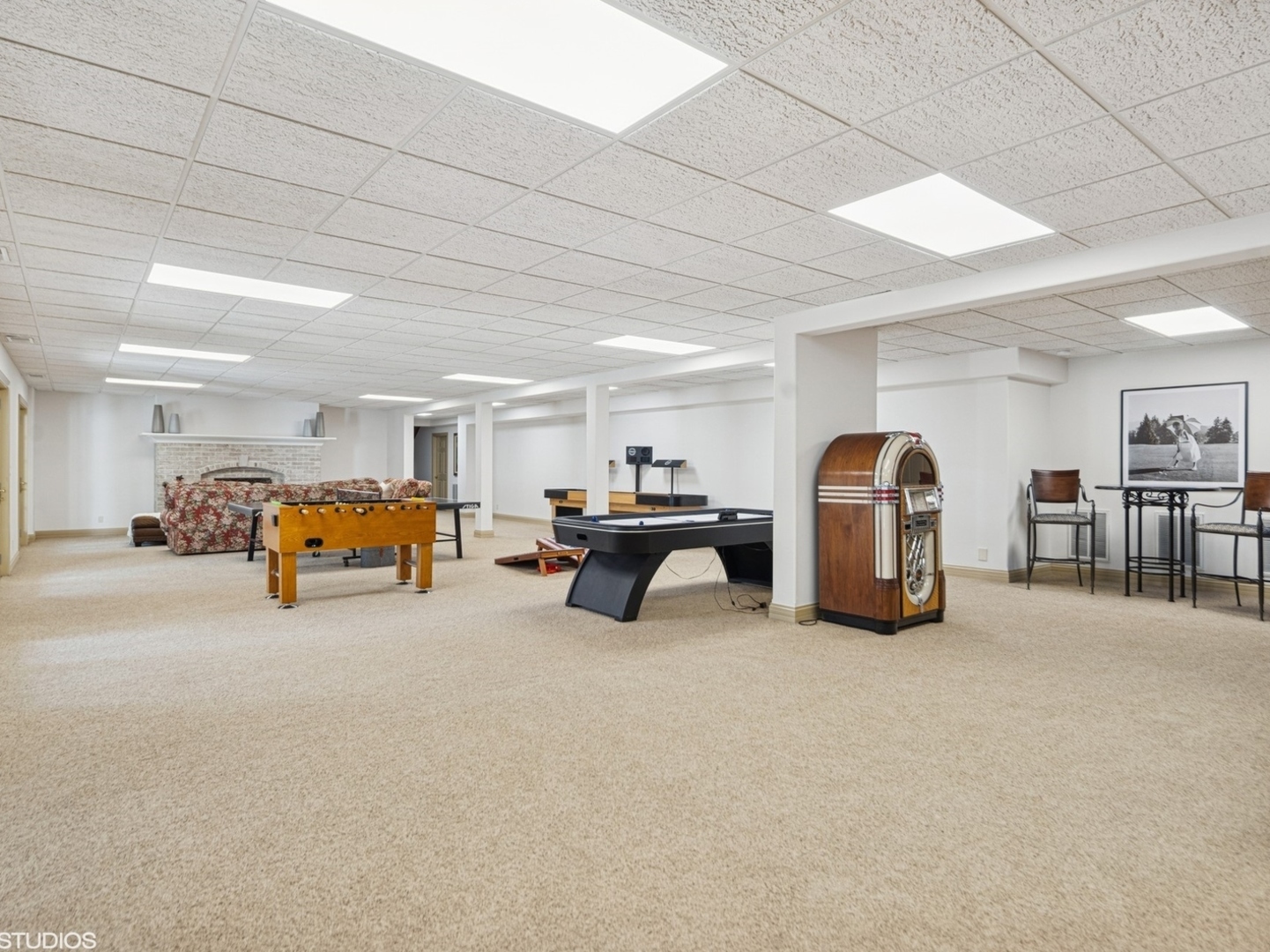 5-n113 Burr Road St. Charles, IL 60175 - Photo 91 of 130 a room with furniture and a chandelier