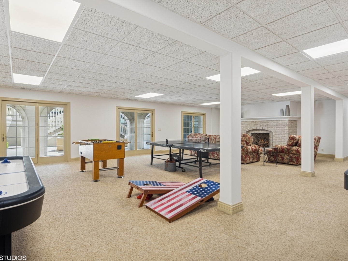 5-n113 Burr Road St. Charles, IL 60175 - Photo 94 of 130 a living room with furniture and a table