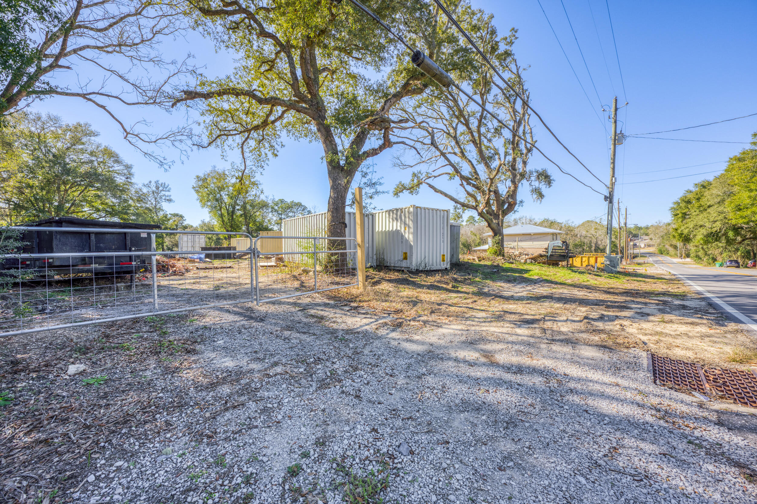 309 Kelly Road Niceville, FL 32578 - Photo 4 of 8 a view of a yard with a tree