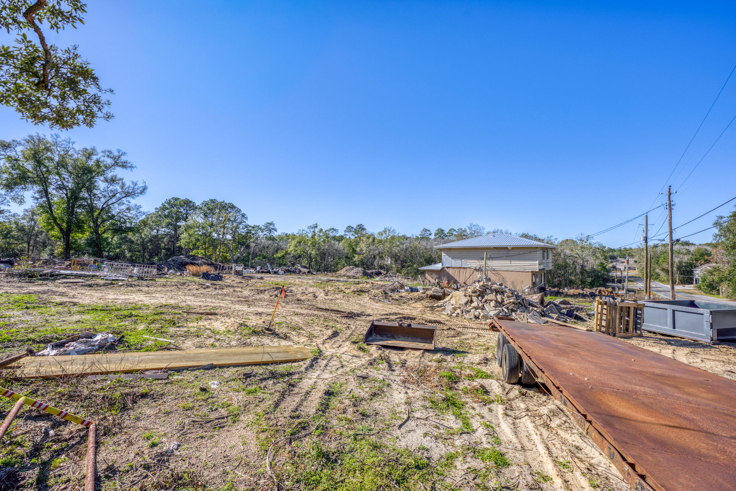 309 Kelly Road Niceville, FL 32578 - Photo 6 of 8 a view of a swimming pool with a yard and sitting area