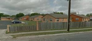 509 Old Robstown Road Corpus Christi, TX 78408 - Photo 6 of 7 a view of a street with brick building in front of it