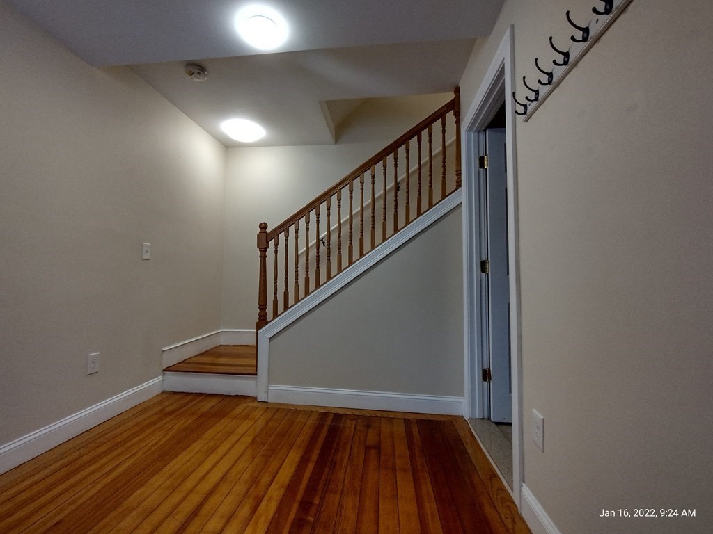 62 Washington Street, Unit 62 Wellesley, MA 02481 - Photo 5 of 18 a view of entryway with wooden floor
