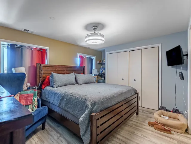 a view of entryway with furniture and a couch