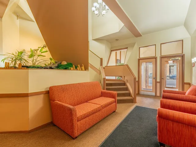 a view of a dinning table and chairs in the patio