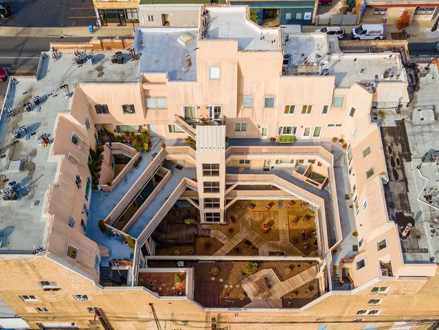 an aerial view of a building with entryway