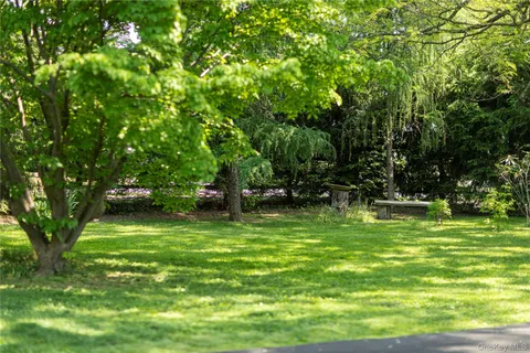 a house view with a garden space