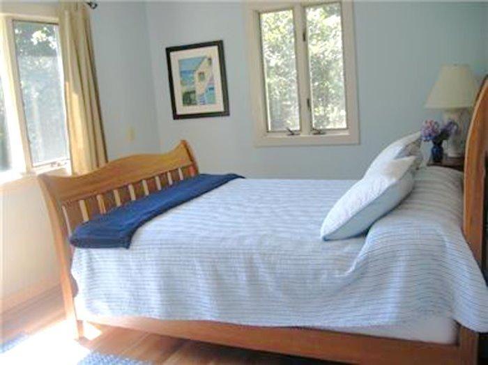 37 Jack Knife Point Road Orleans, MA 02653 - Photo 8 of 13 a bed sitting in a bedroom next to a window