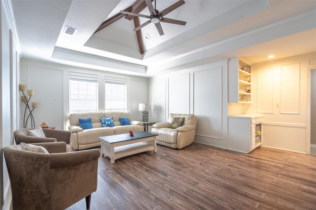 3905 Cross Bend Road Plano, TX 75023 - Photo 12 of 27 a living room with furniture and a large window