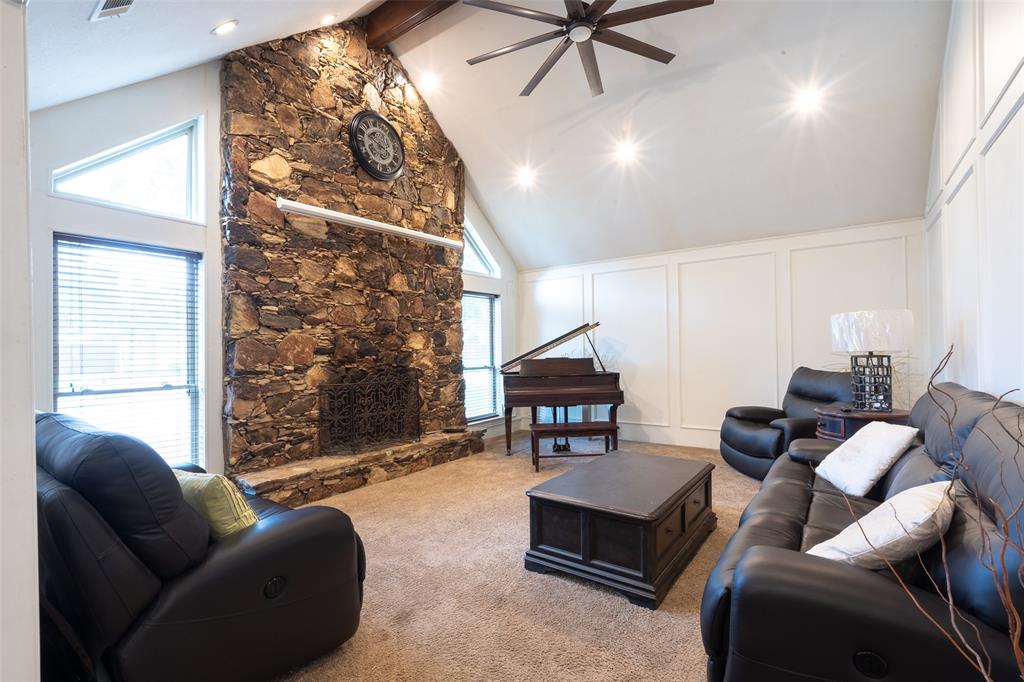 3905 Cross Bend Road Plano, TX 75023 - Photo 2 of 27 a living room with furniture and a floor to ceiling window