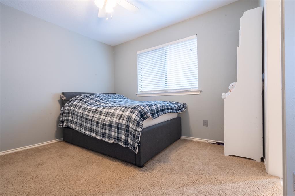 3905 Cross Bend Road Plano, TX 75023 - Photo 6 of 27 a room with a bed and a window