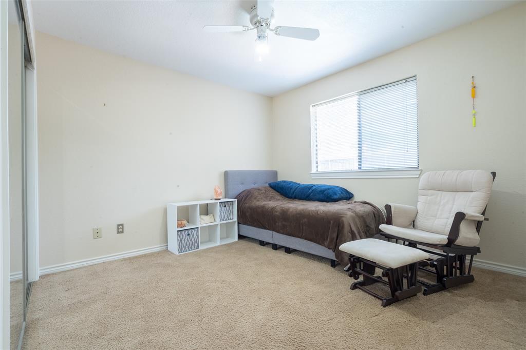 3905 Cross Bend Road Plano, TX 75023 - Photo 10 of 27 a living room with furniture and a window