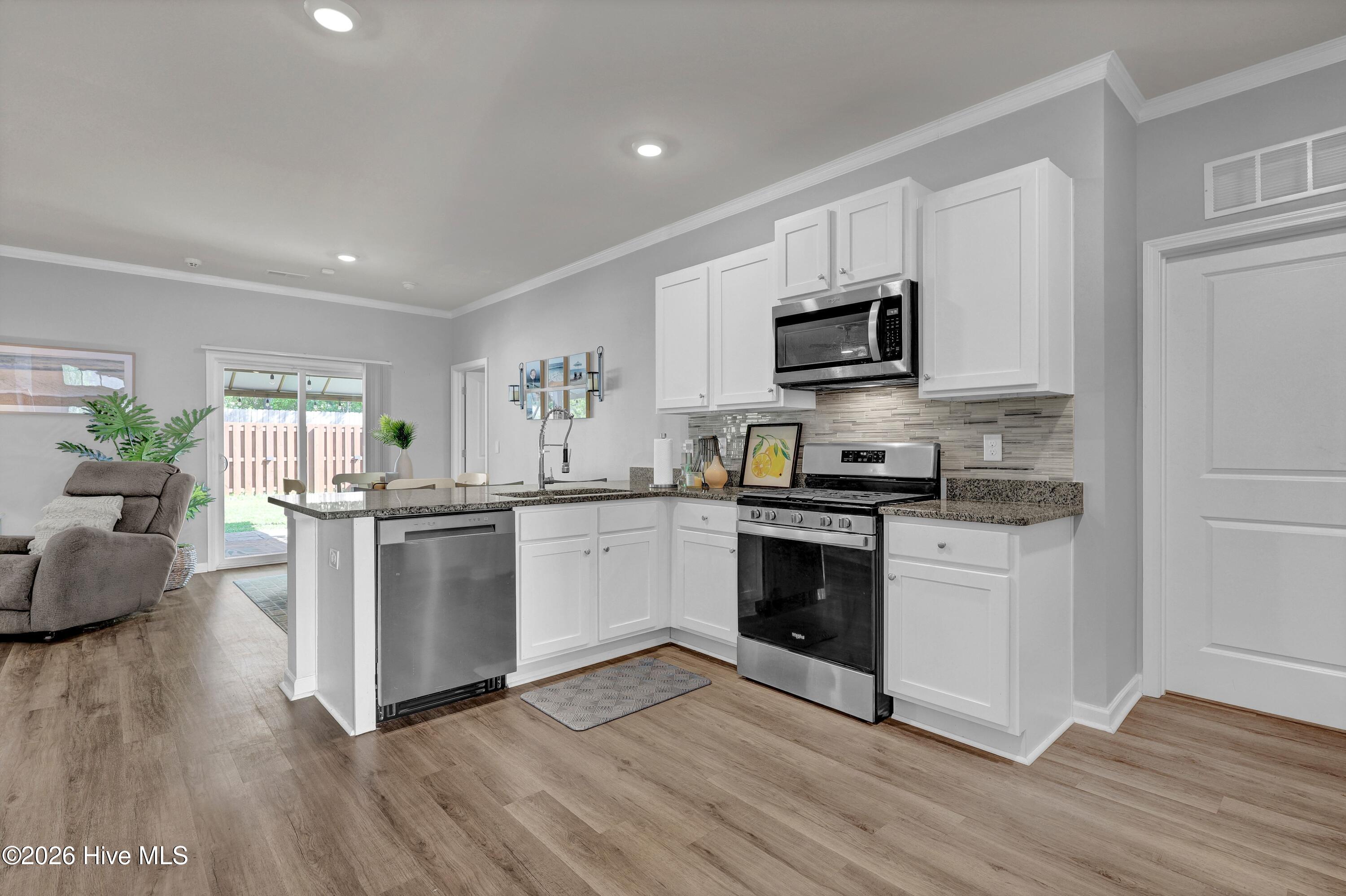 116 Sir Clyde Road Wilmington, NC 28411 - Photo 5 of 29 004_img_6023_841