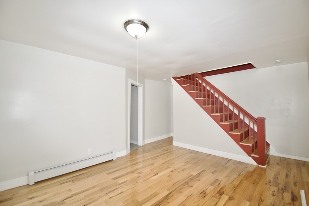 38 Collins Street Springfield, MA 01109 - Photo 14 of 39 a view of an entryway with wooden floor