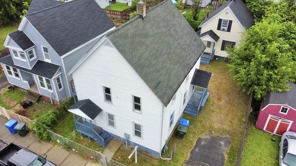 38 Collins Street Springfield, MA 01109 - Photo 2 of 39 a aerial view of a house with a yard