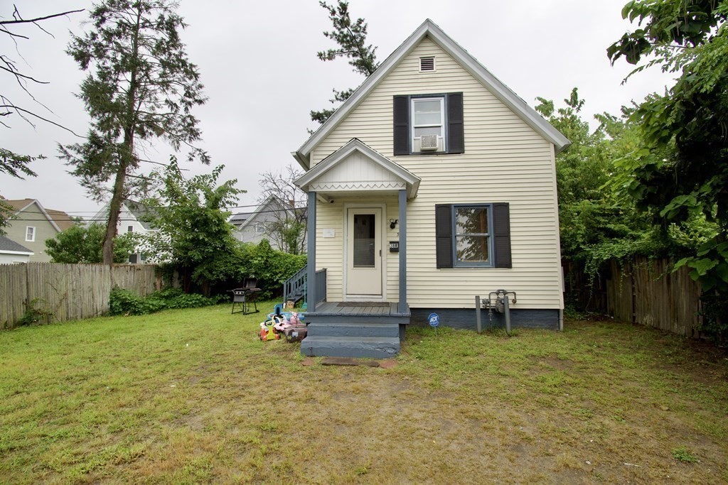 38 Collins Street Springfield, MA 01109 - Photo 4 of 39 a view of a house with a yard