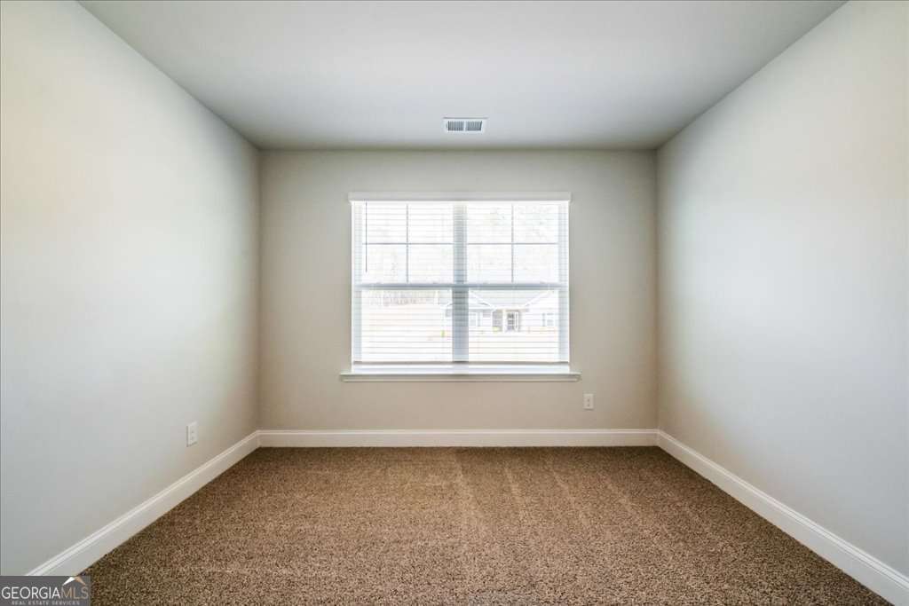 219 Carsons Walk Macon, GA 31206 - Photo 39 of 57 an empty room with a window