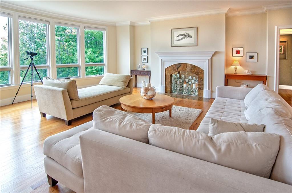 106 Ravine Drive Cumberland Foreside, ME 04110 - Photo 8 of 29 Open living room with crown molding...
