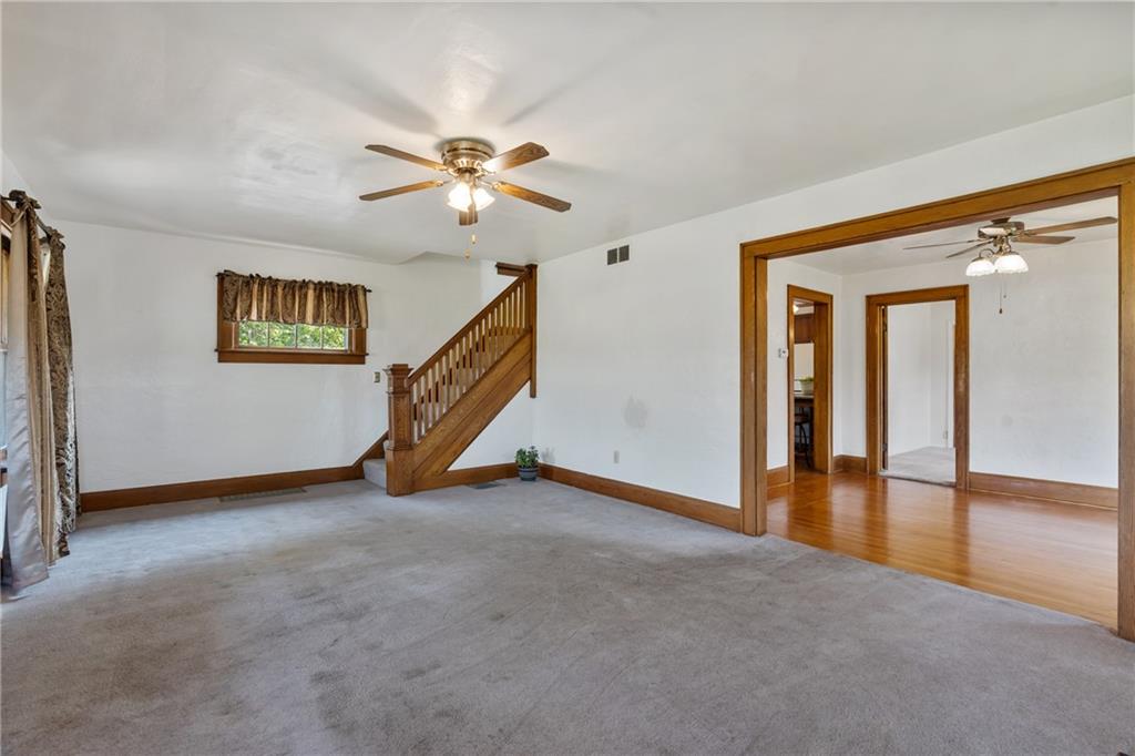 1557 Pittsburgh Road Franklin, PA 16323 - Photo 12 of 33 a view of an empty room with a ceiling fan