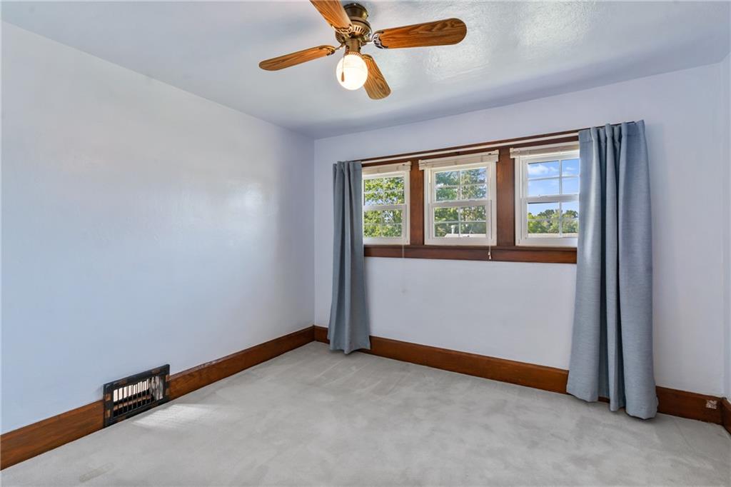 1557 Pittsburgh Road Franklin, PA 16323 - Photo 25 of 33 a view of an empty room with a window
