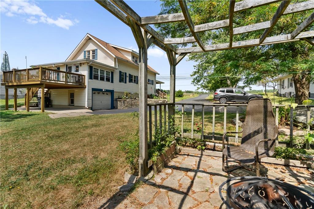 1557 Pittsburgh Road Franklin, PA 16323 - Photo 6 of 33 a front view of a house with a porch