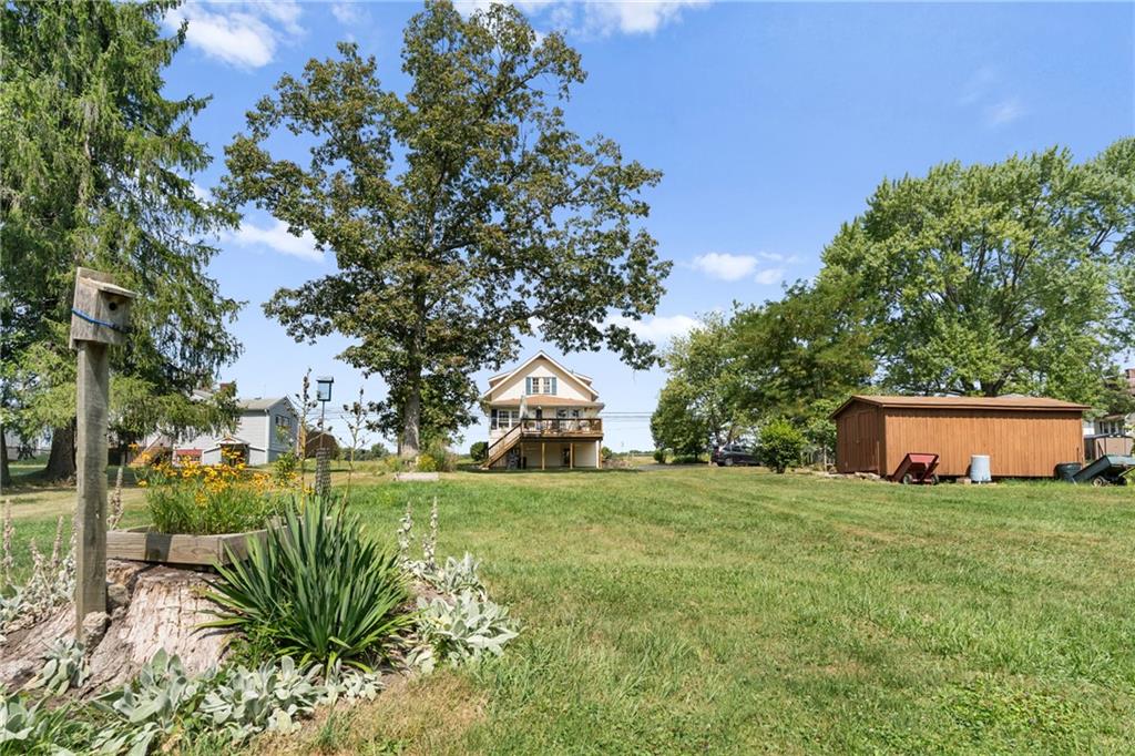 1557 Pittsburgh Road Franklin, PA 16323 - Photo 8 of 33 a view of a house with a yard