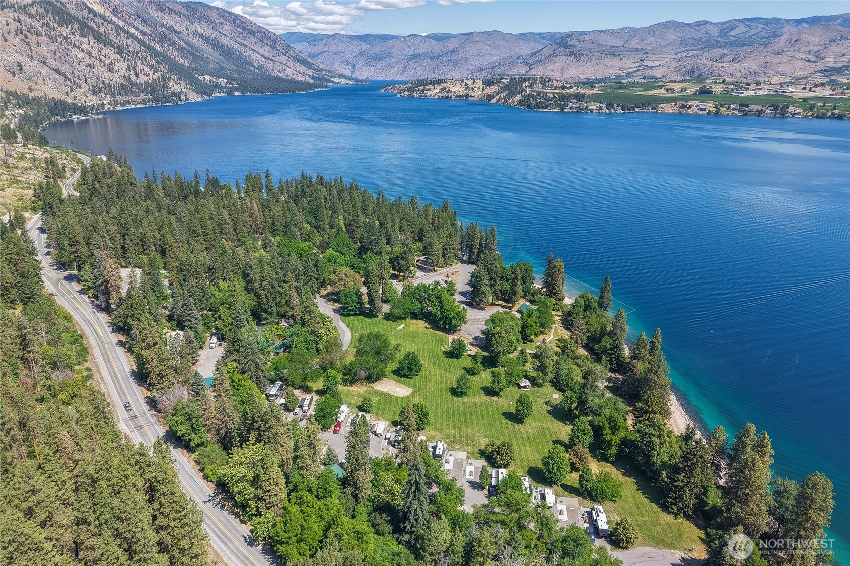 7-xxx Navarre Coulee Road Chelan, WA 98816 - Photo 16 of 30 a view of a lake with a mountain