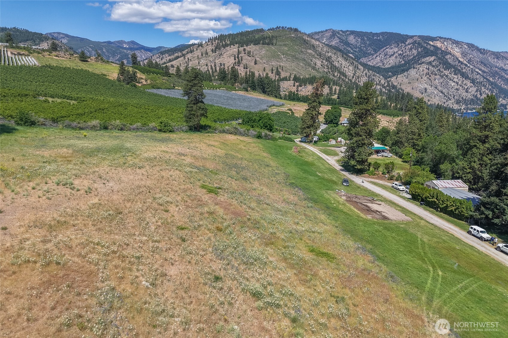7-xxx Navarre Coulee Road Chelan, WA 98816 - Photo 30 of 30 a view of a field with an trees