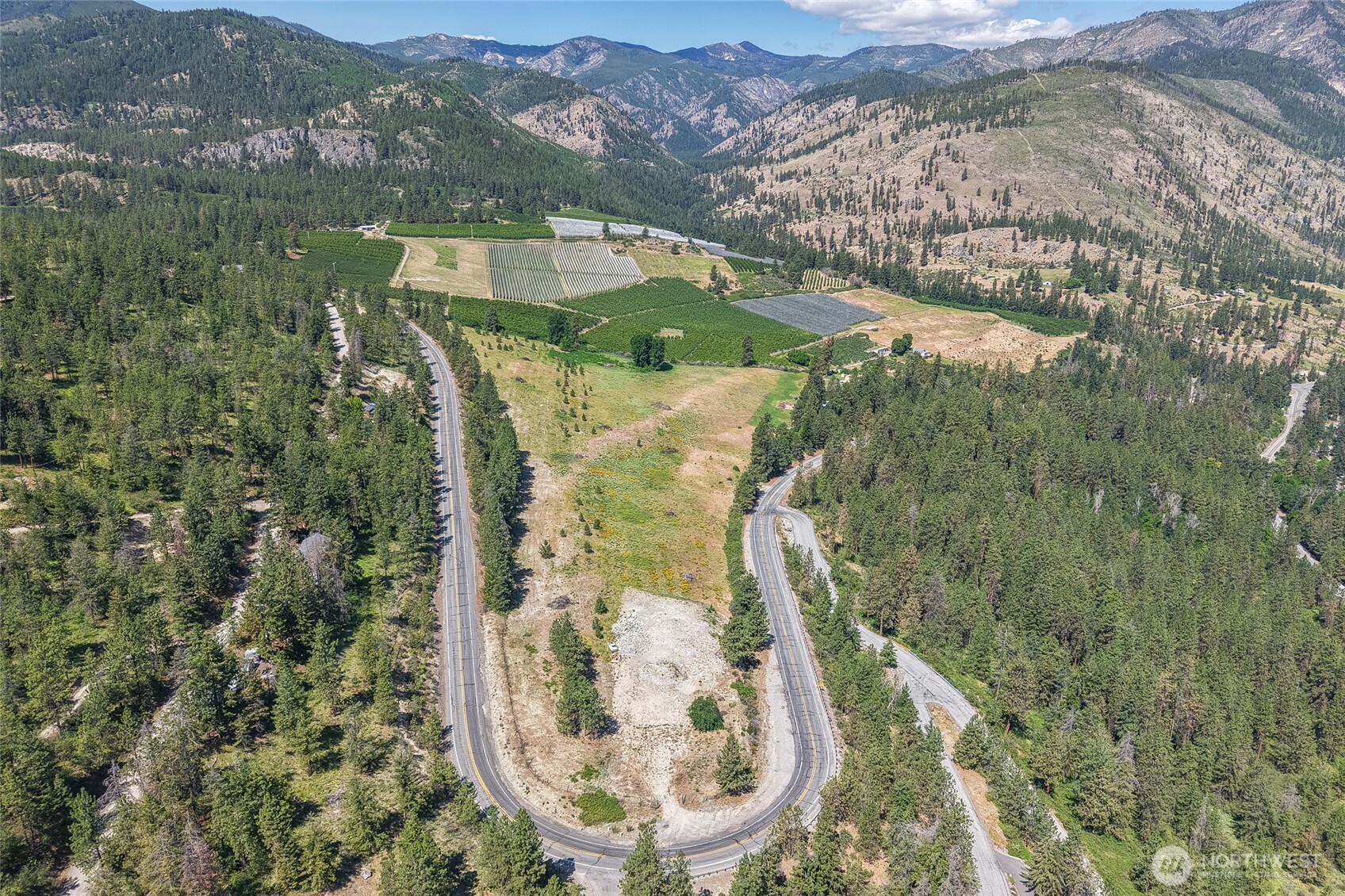 7-xxx Navarre Coulee Road Chelan, WA 98816 - Photo 7 of 30 an aerial view of a house with a yard and lake view