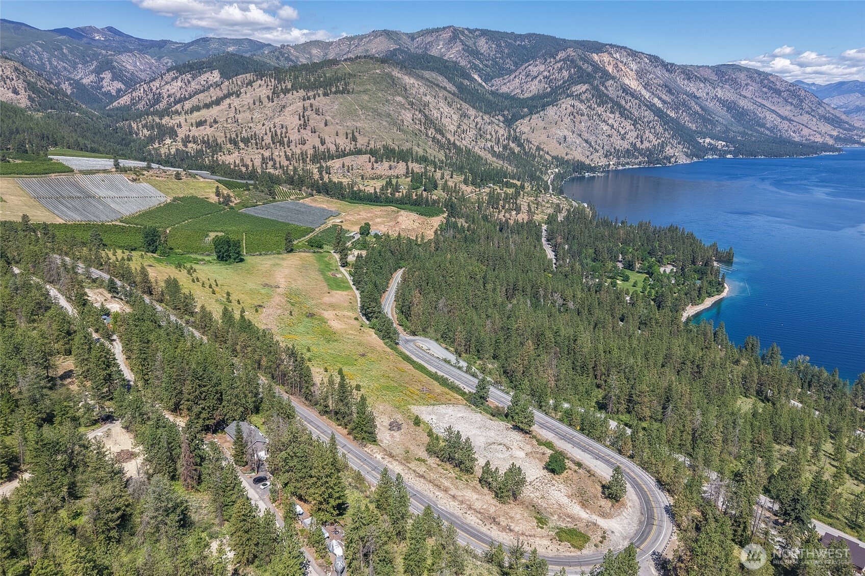 7-xxx Navarre Coulee Road Chelan, WA 98816 - Photo 8 of 30 a view of a house with a yard