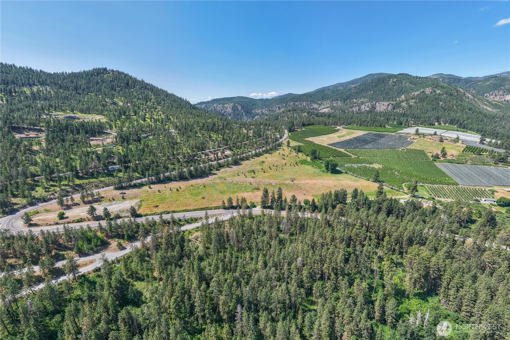7-xxx Navarre Coulee Road Chelan, WA 98816 - Photo 9 of 30 a view of a town with mountains in the background